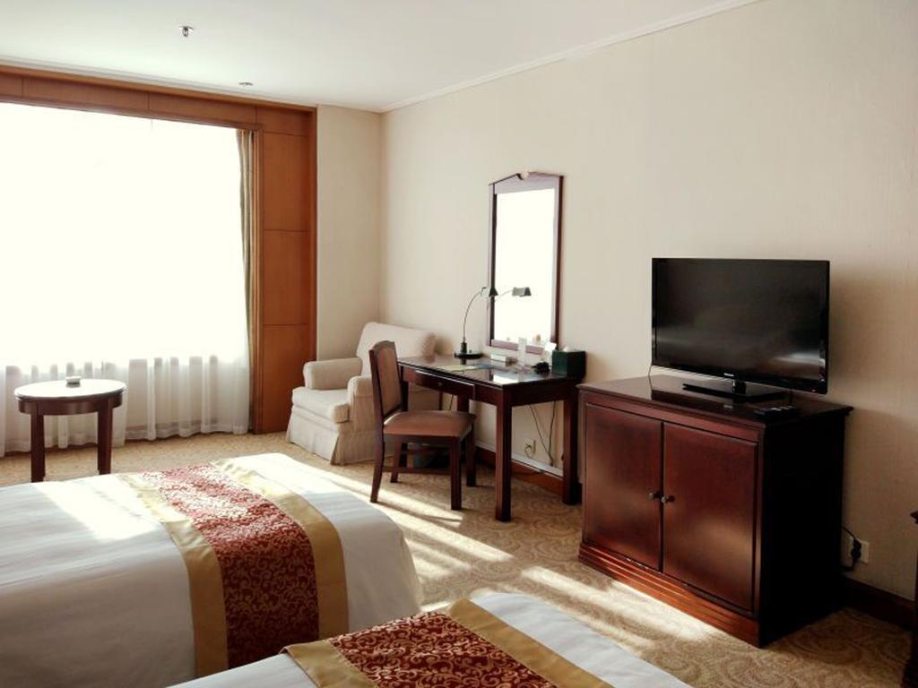 Central Plaza Hotel Dalian Extérieur photo
